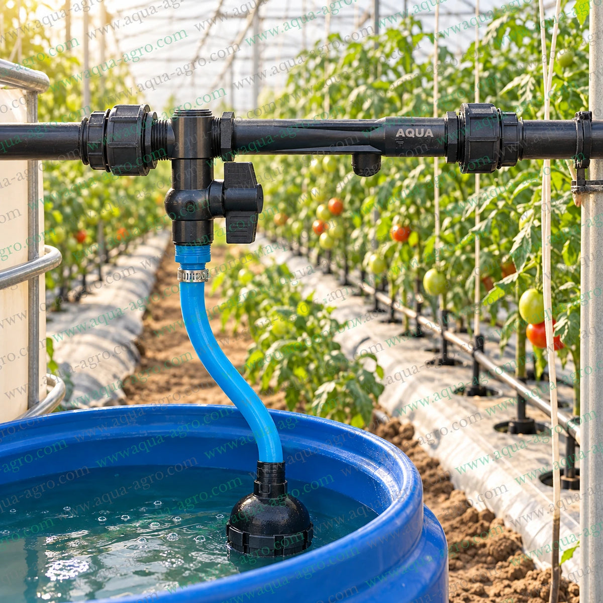 AQUA AGRO 1 inch Venturi fertilizer injector installed on an irrigation pipeline in a greenhouse with blue suction hose connected to a liquid fertilizer tank for fertilizer injection drip irrigation fertigation and nutrient distribution in agricultural crops