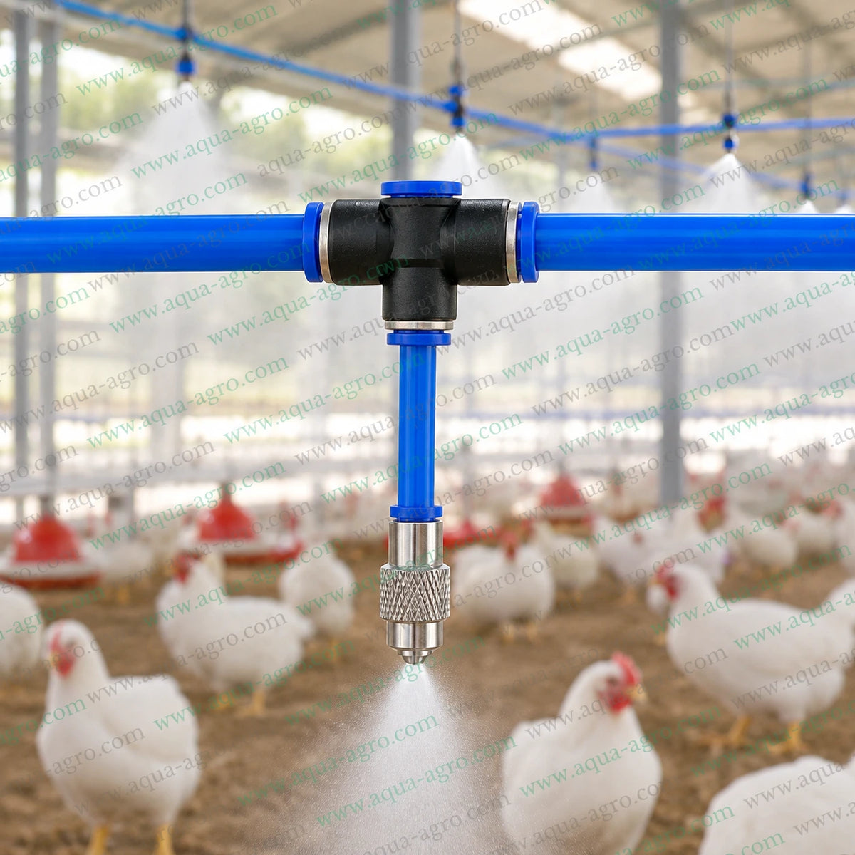 AQUA AGRO PU reducer tee connector 8mm x 6mm x 8mm installed on a poultry farm misting pipeline with blue PU tubing and stainless steel fogger nozzle for overhead cooling and humidity control