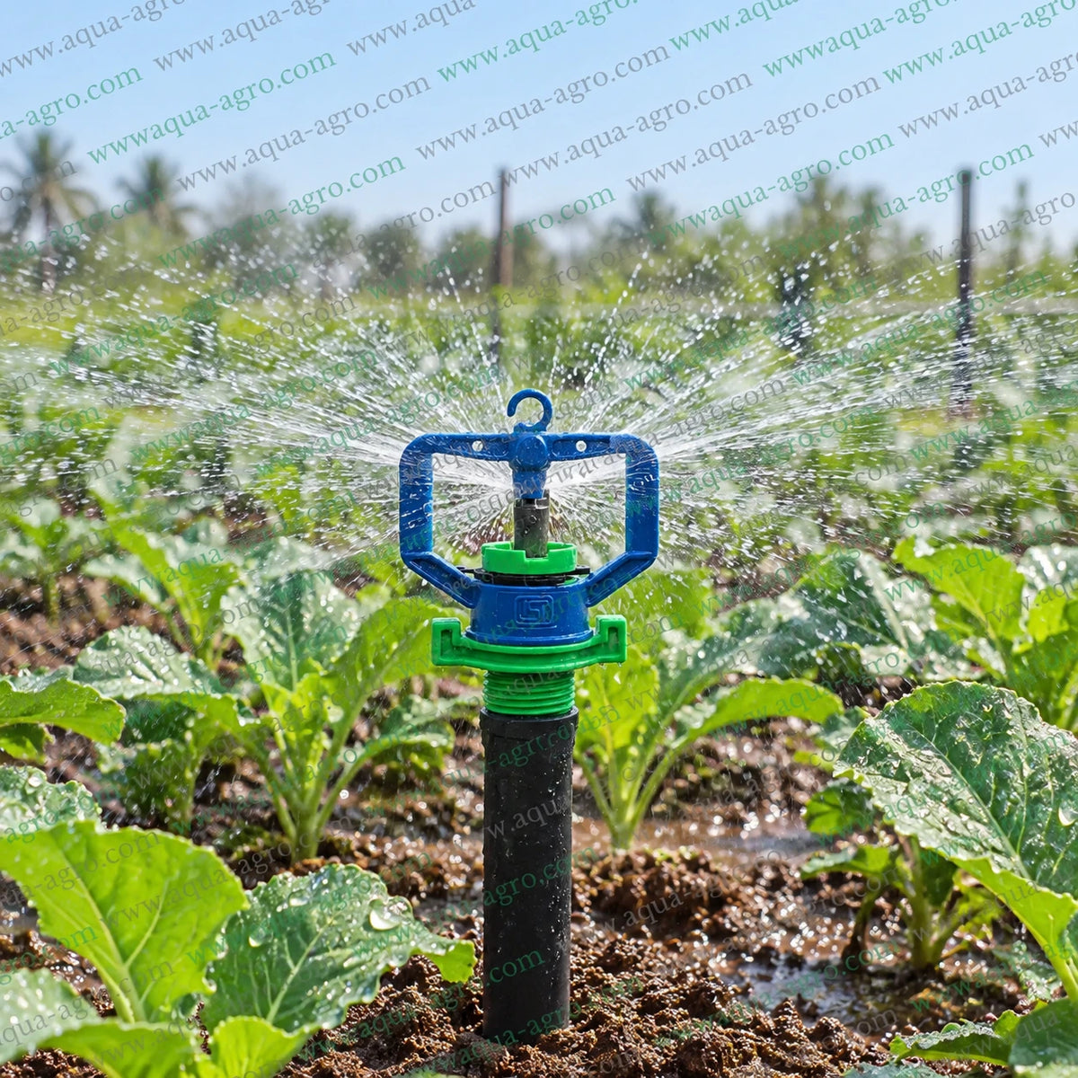 AUTOMAT Aquamic Excel HT-211 green micro sprinkler in operation with 360 degree full circle water spray 10 to 15 feet radius 0.375 inch 9.5mm male threaded inlet for farm garden nursery and agricultural irrigation