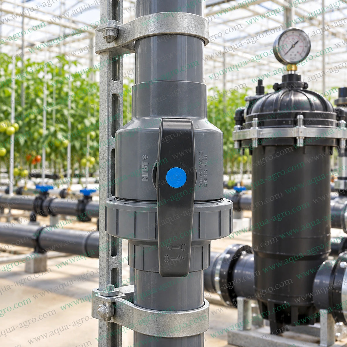 JAIN 3 inch (90mm) heavy-duty PVC single union ball valve installed on a supported irrigation pipeline in a greenhouse, suitable for agriculture, drip irrigation, filtration systems, water distribution networks and high-flow irrigation applications.