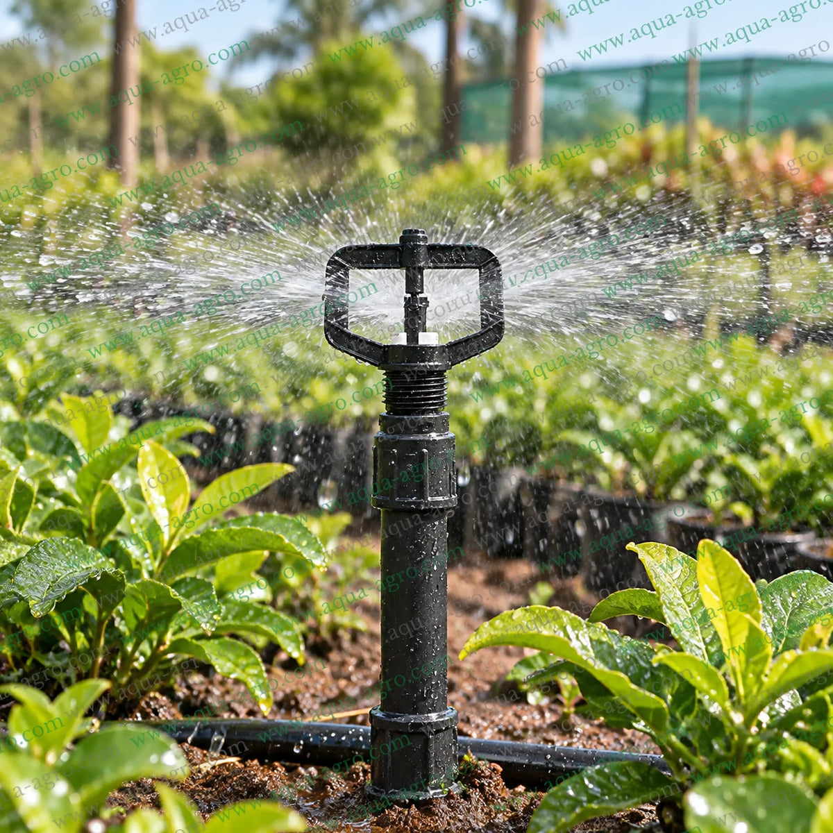 JAIN J-Mini JMJ-WH micro sprinkler operating in nursery field with 360 degree full circle swivel rotor water spray 9 to 13 feet radius for agricultural irrigation