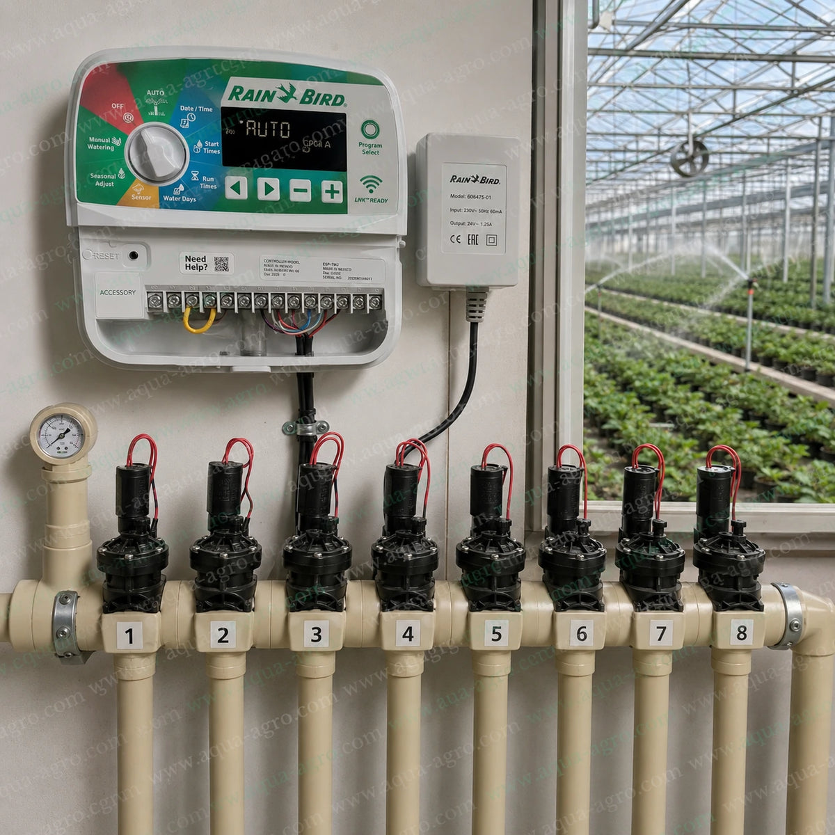 Rain Bird ESP-TM2 8 station irrigation controller installed with eight solenoid valves for automatic greenhouse irrigation and smart watering control