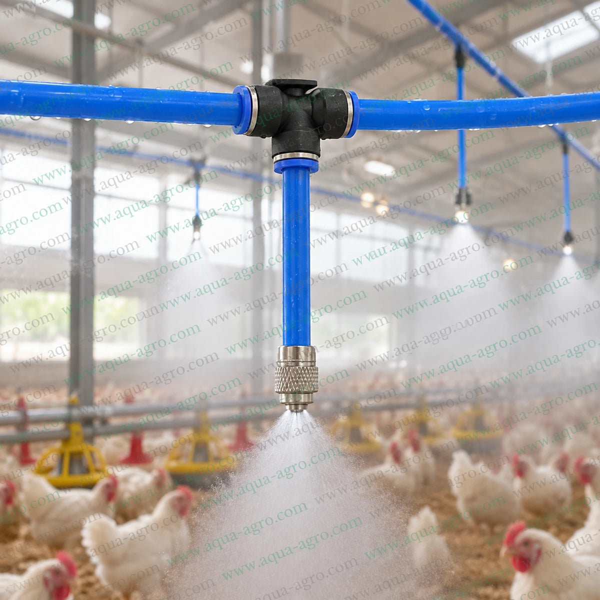 AQUA AGRO 8mm PU tee connector installed on blue polyurethane tubing with stainless steel fogger nozzle spraying fine mist in poultry farm cooling and humidity control system