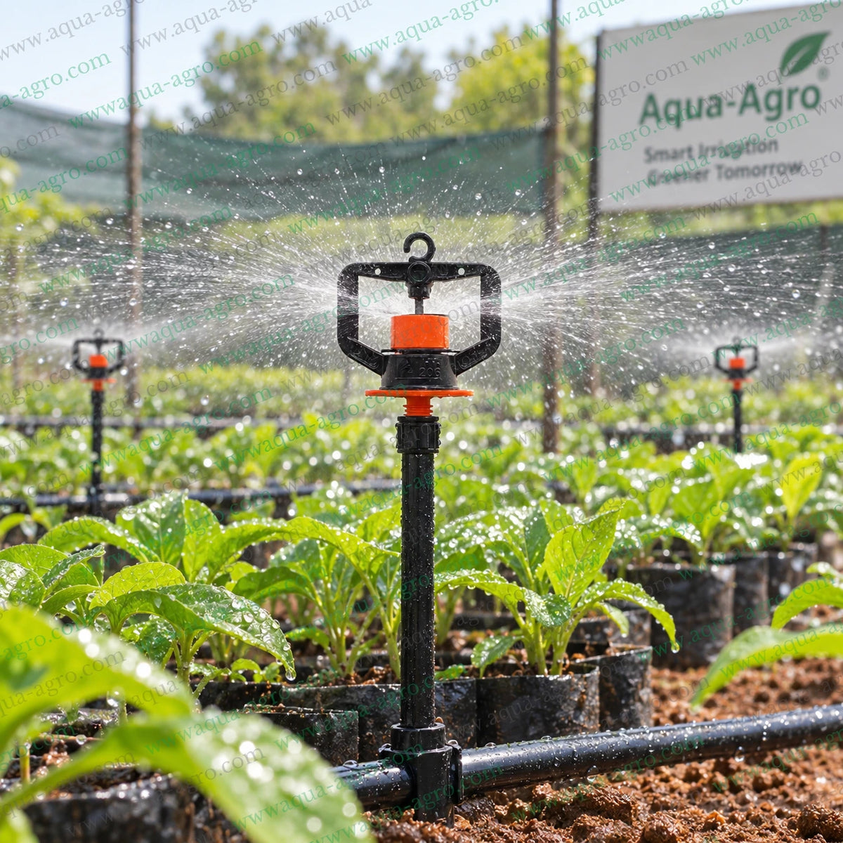 AUTOMAT Aquatuff Excel HT-206 orange micro sprinkler operating in nursery with full circle 360 degree water spray for orchards nurseries field crops and agricultural irrigation