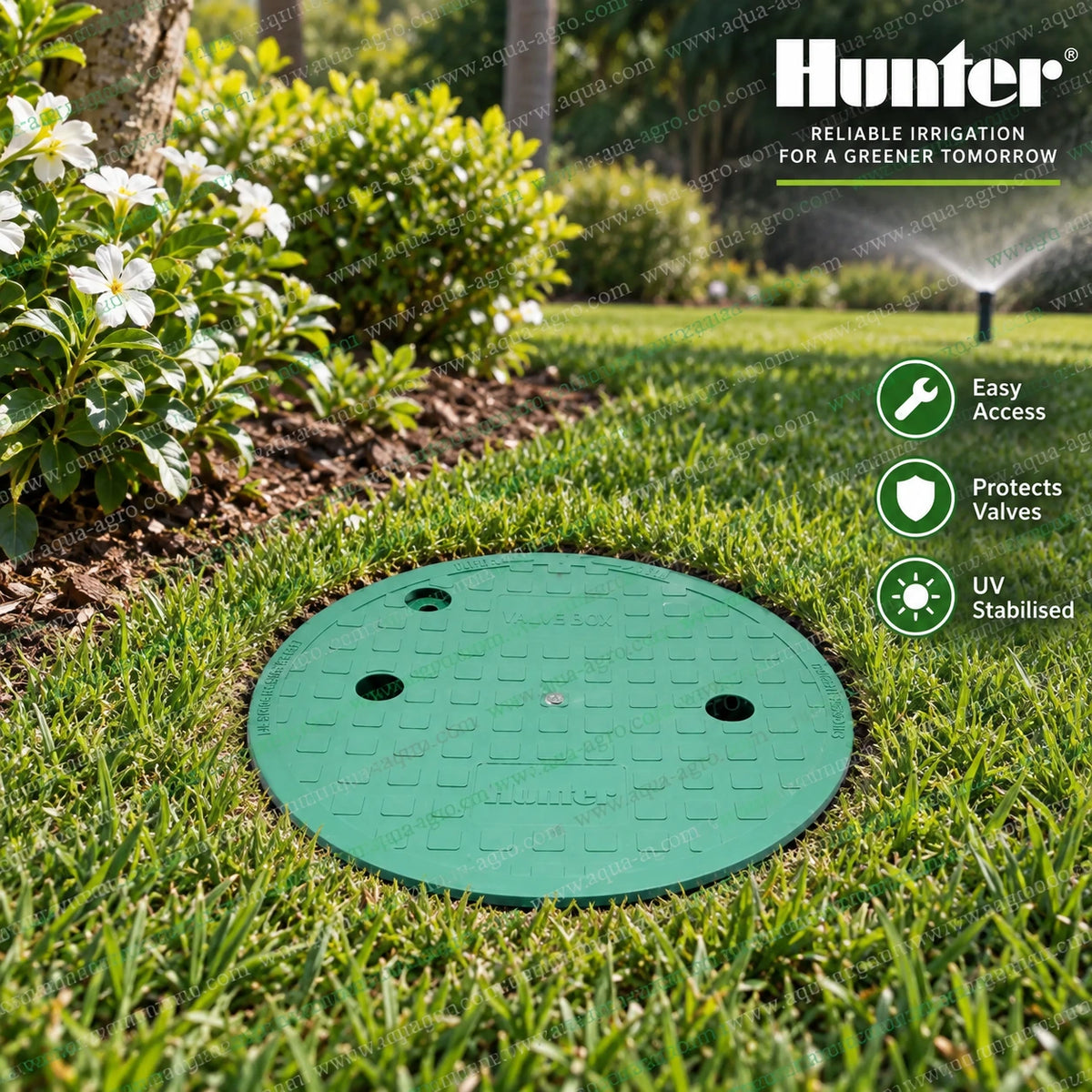 HUNTER 10 inch round plastic irrigation valve box with green lid installed flush with garden lawn for protecting underground sprinkler control valves and irrigation pipe fittings in residential gardens and landscape irrigation systems